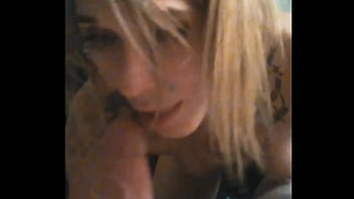 Fine tatted youngster swallowing meat