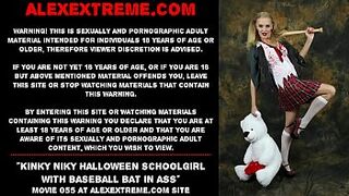Naughty Niky Halloween schoolgirl with baseball bat in rear-end