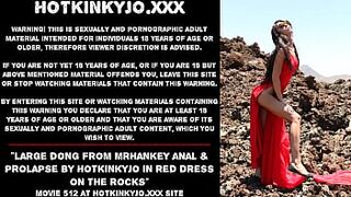 Humongous dick from mrHankey anal & prolapse by Hotkinkyjo in red dress on the rocks